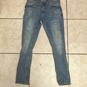 Distressed Blue Jeans